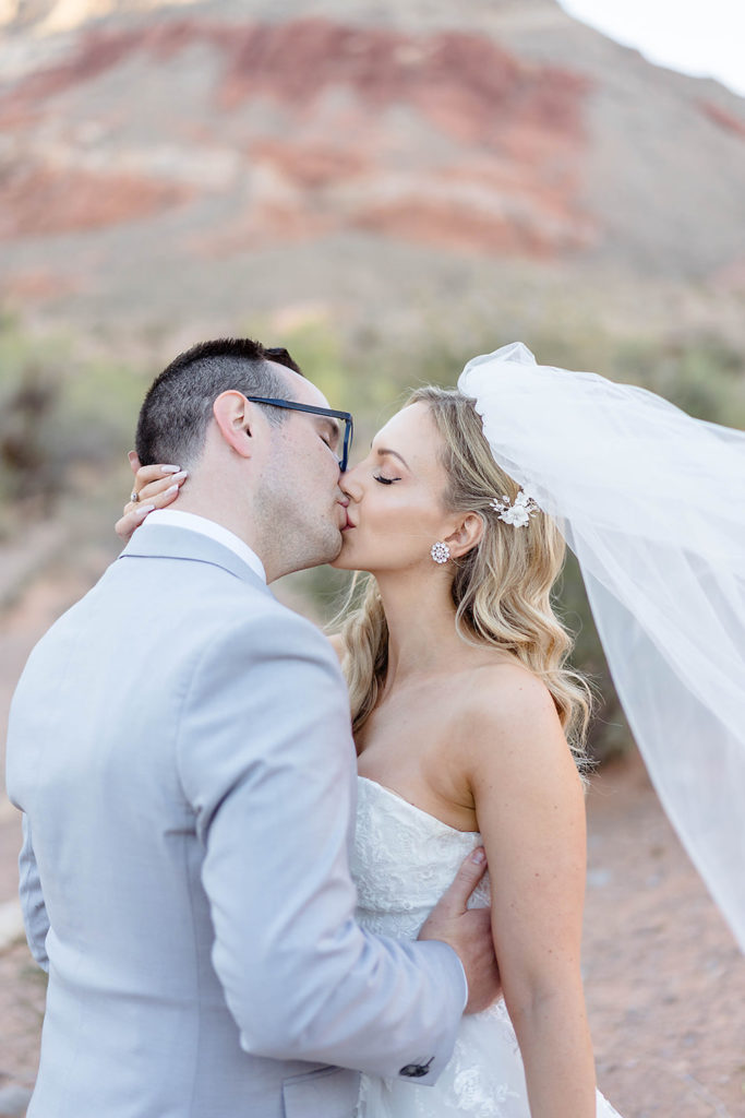 Places to Get Married in Las Vegas (Off the Strip): Bride and groom share a kiss during their Las Vegas wedding