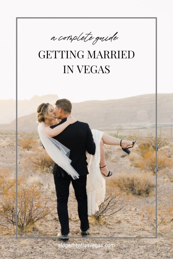 Groom carries bride and kisses her during their elopement shoot in Las Vegas; image overlaid with text that reads Getting Married in Vegas: A Complete Guide