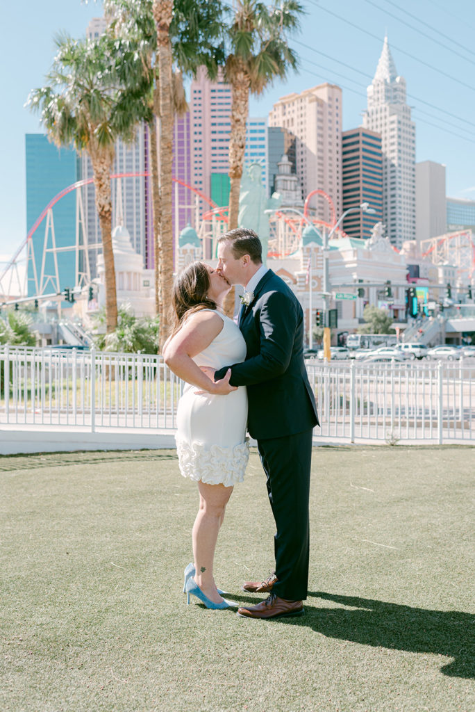 Bride and groom sharing a kiss during their wedding shoot with Elopement Las Vegas