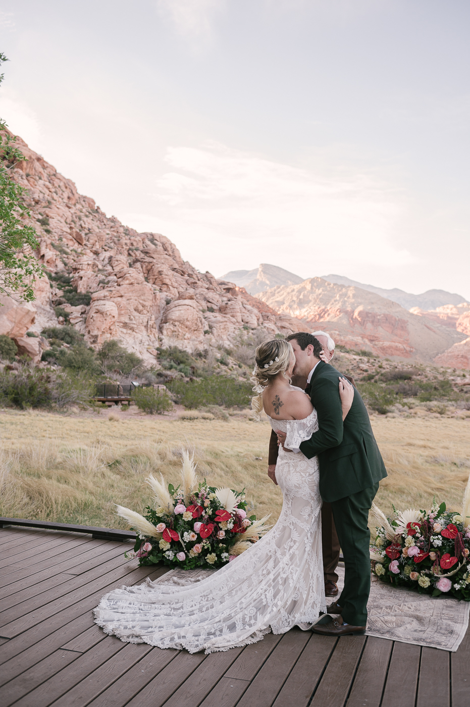 Couple sharing a kiss during their elopement ceremony arranged by Elopement Las Vegas