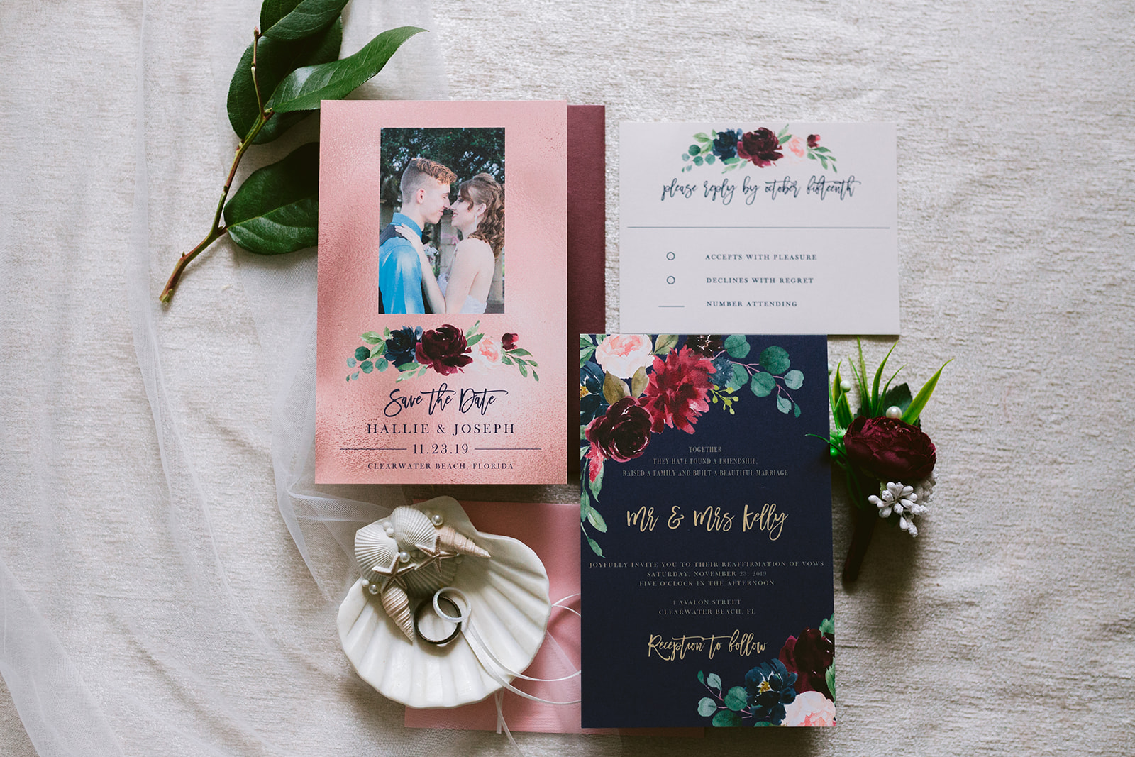 How Much Does It Cost To Get Married In Vegas. Flat-lay shot of wedding invitations and cards with floral theme.