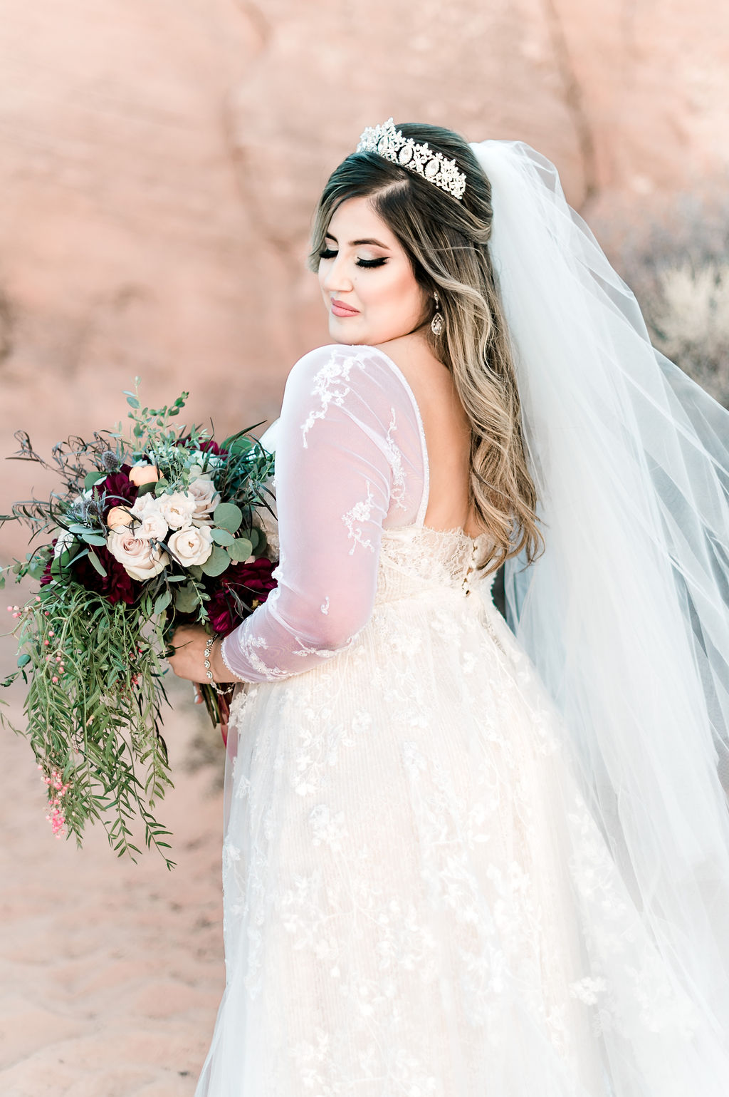 Stunning bride posing with her bouquet during their wedding shoot in Las Vegas