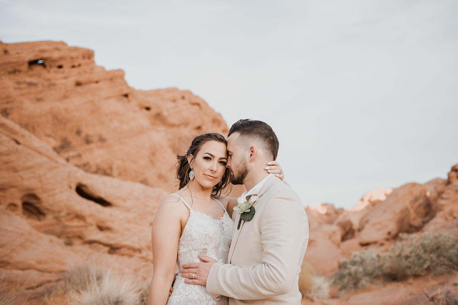 Valley of Fire Wedding & Elopement Planning Guide. Newlywed couple posing together during their elopement shoot coordinated by Elopement Las Vegas.