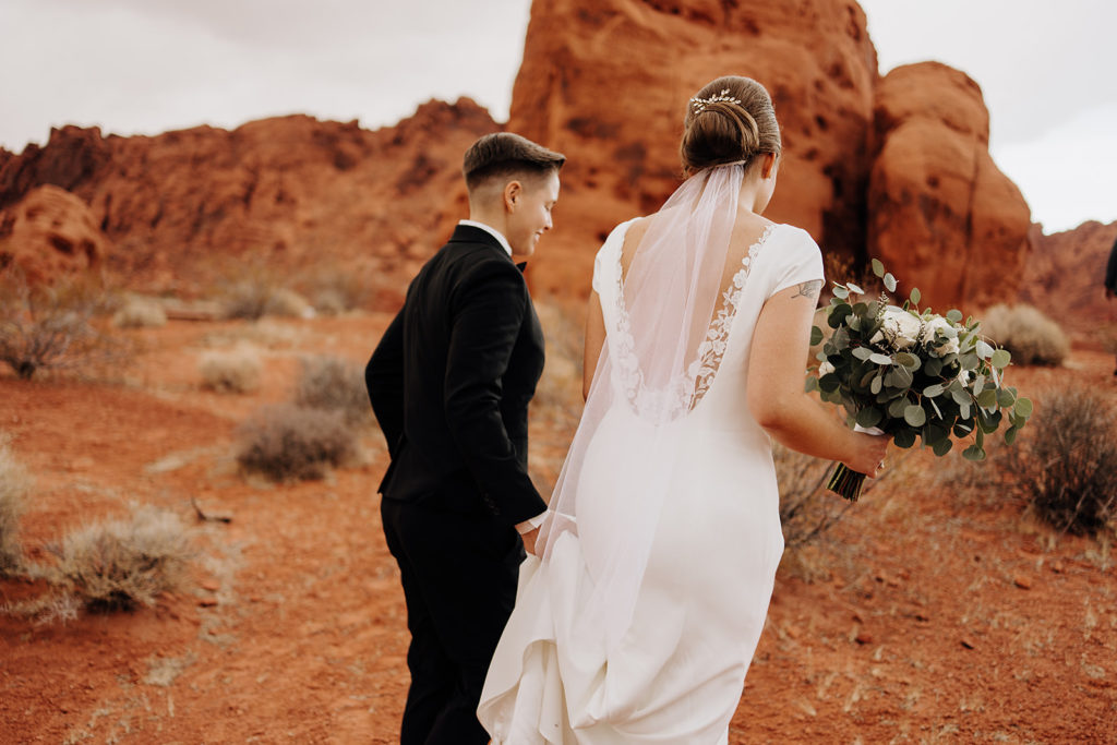 Couple walking together during their Valley of Fire elopement shoot