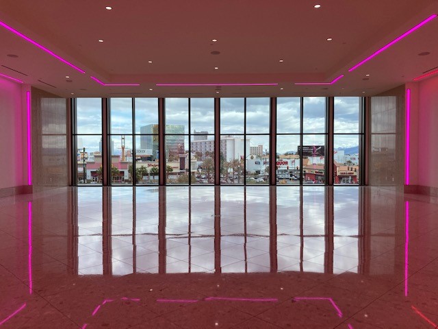 All Inclusive Resorts World Wedding Package (Las Vegas). View of The District Overlook with pink lights.