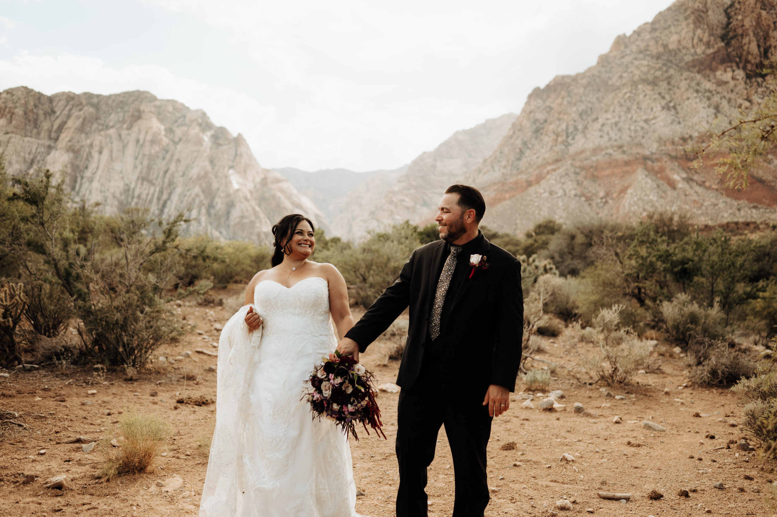Couple holding hands during Spring Mountain Ranch Wedding & Elopement shoot