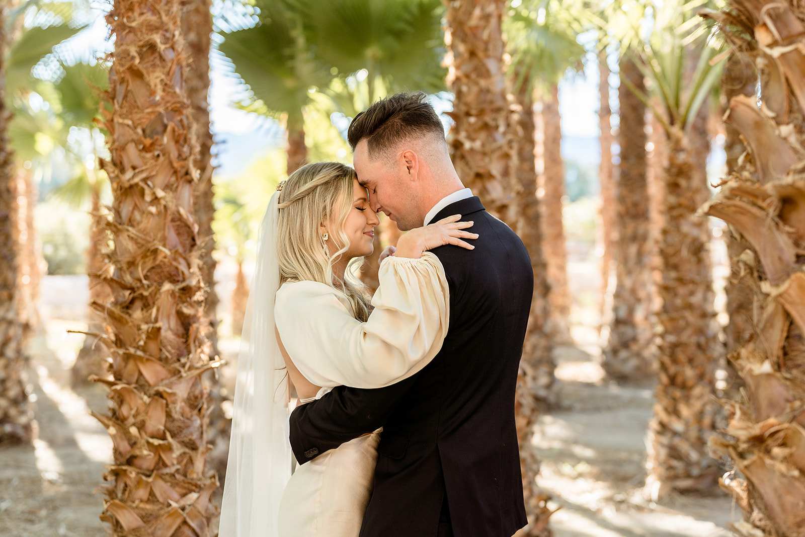 Couple sharing an embrace during their GreenGale Farms elopement shoot arranged by Elopement Las Vegas