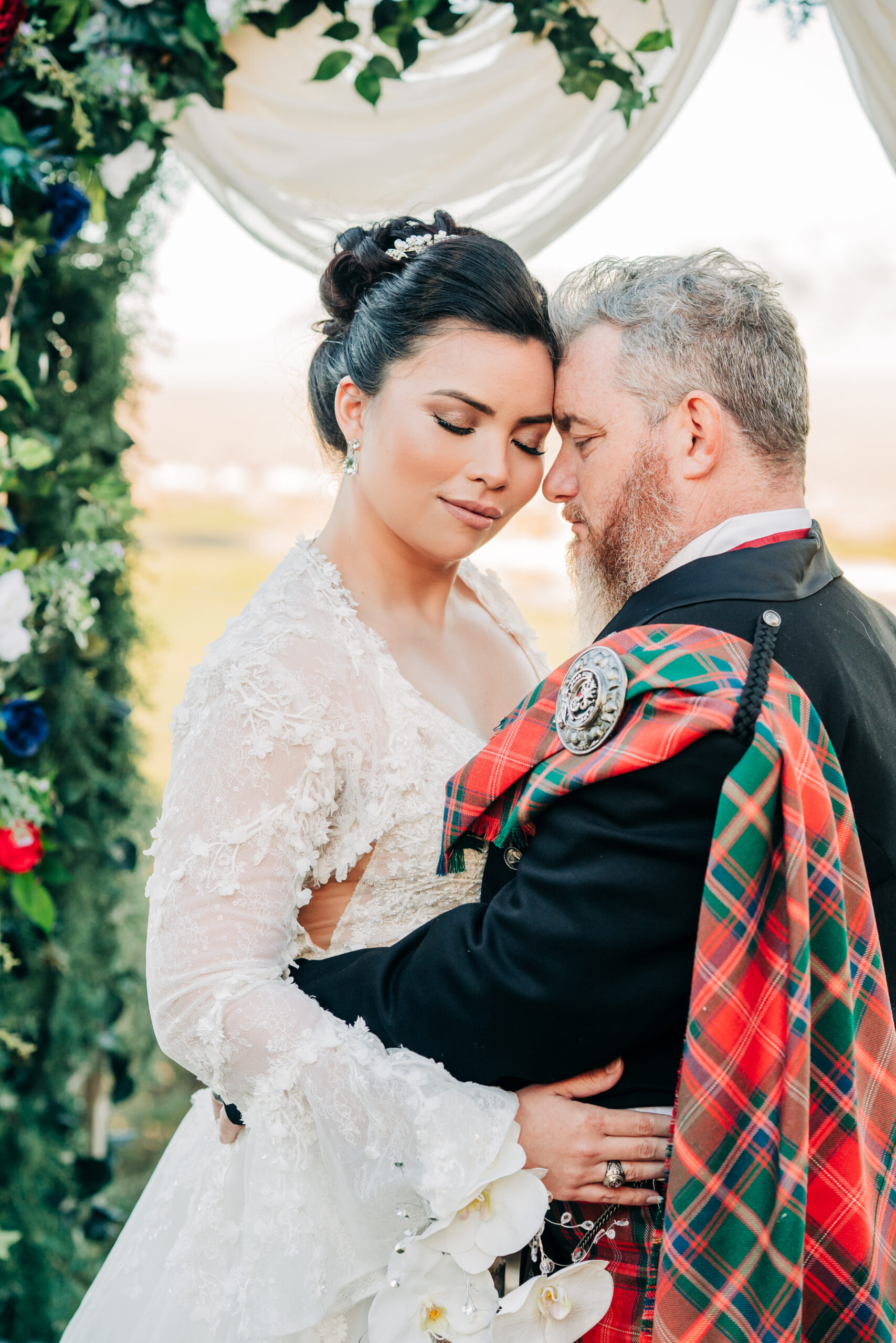 Bride and groom sharing an embrace during their Paiute Golf Course Elopement