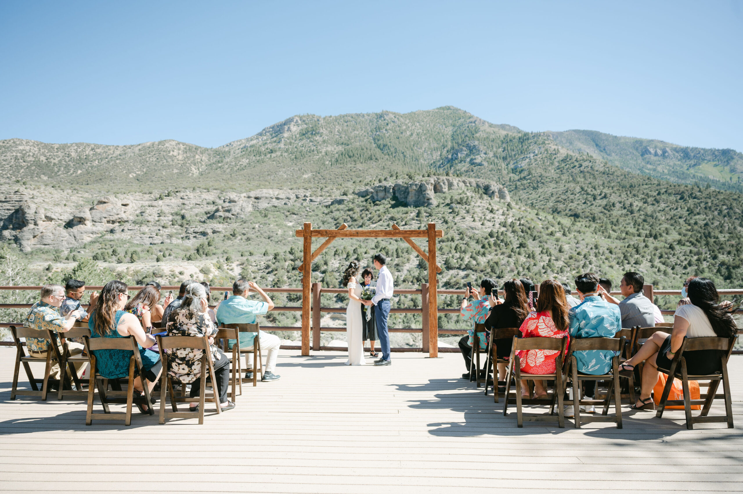 Bride and groom holding hands during their elopement in Mount Charleston