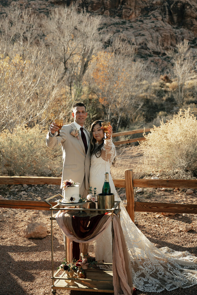 champagne toast outdoor wedding ceremony red rock canyon