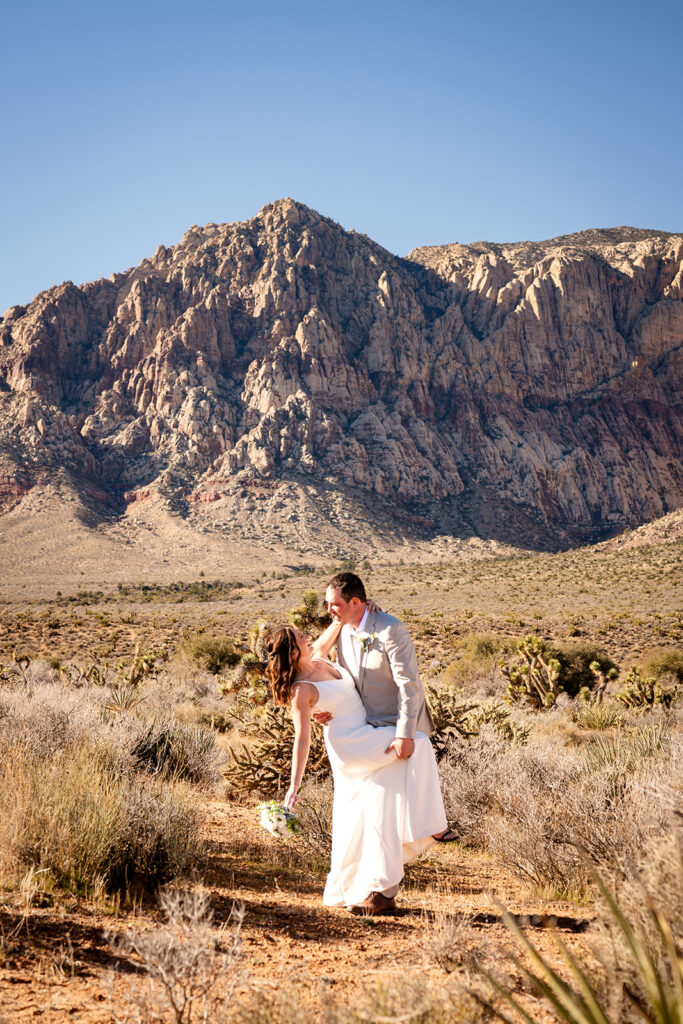 couple exchanging vows at red rock canyon las vegas elopement